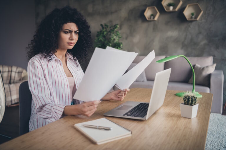 businesswoman confused by report