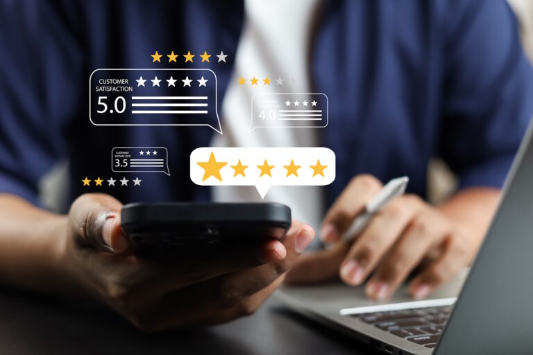 man looking at business reviews