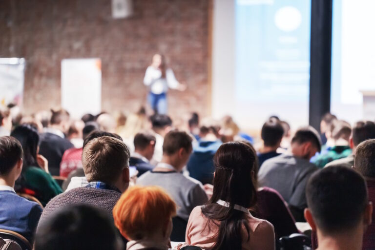 people sitting at conference